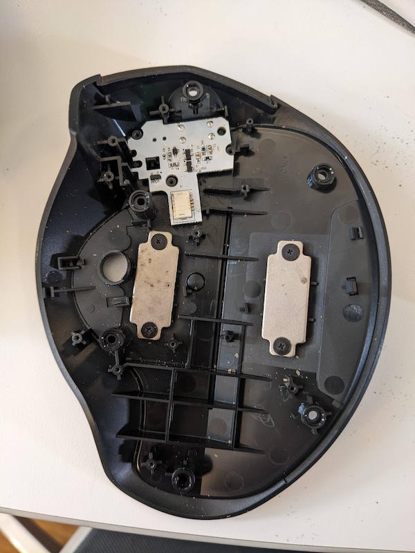 Logitech MX Ergo shell bottom with the new USB-C board inserted