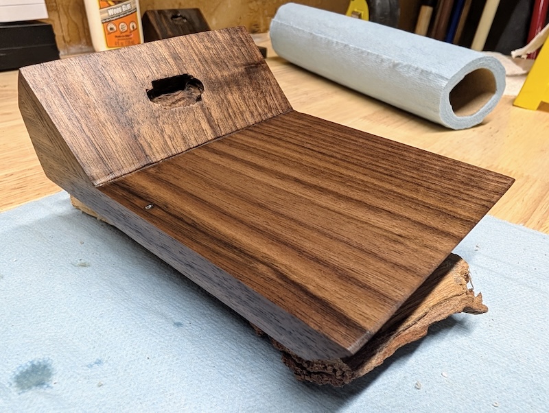 A black walnut coaster with Osmo Polyx Hard Wax Oil #3054 rubbed in