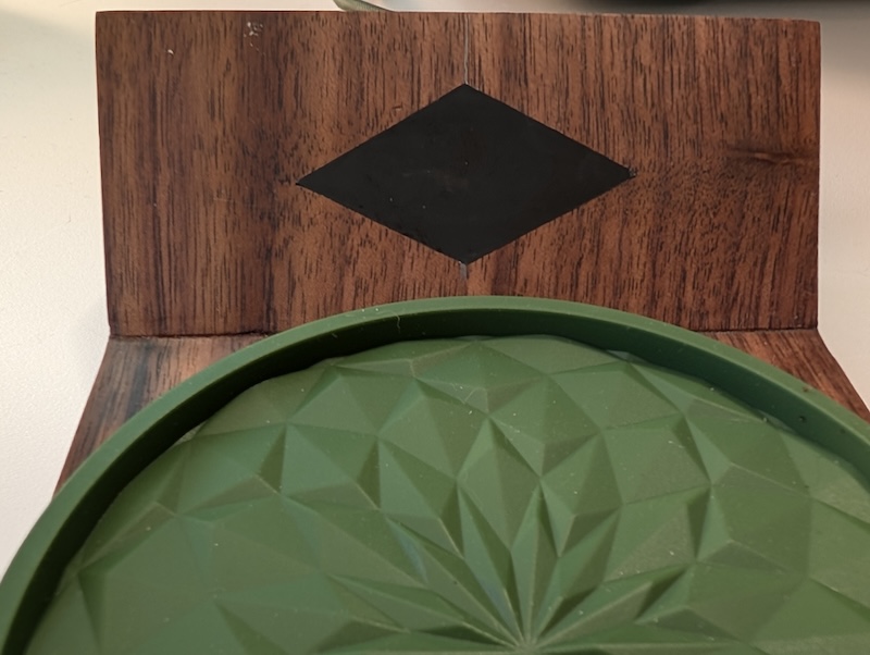 A sticker covering the time-of-flight sensor on my Smart Coaster V3